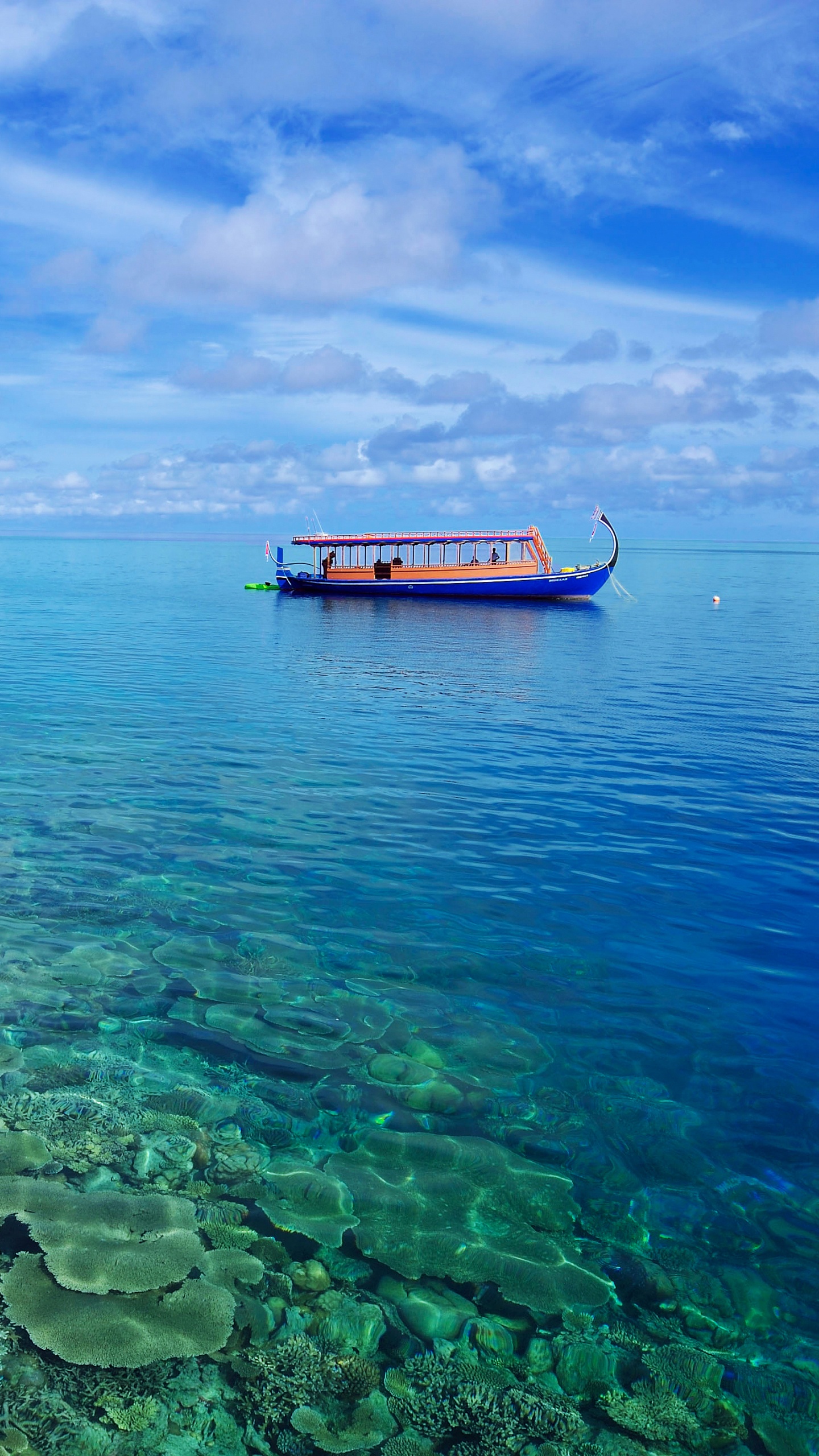 Red and White Boat on Sea Under Blue Sky During Daytime. Wallpaper in 1440x2560 Resolution