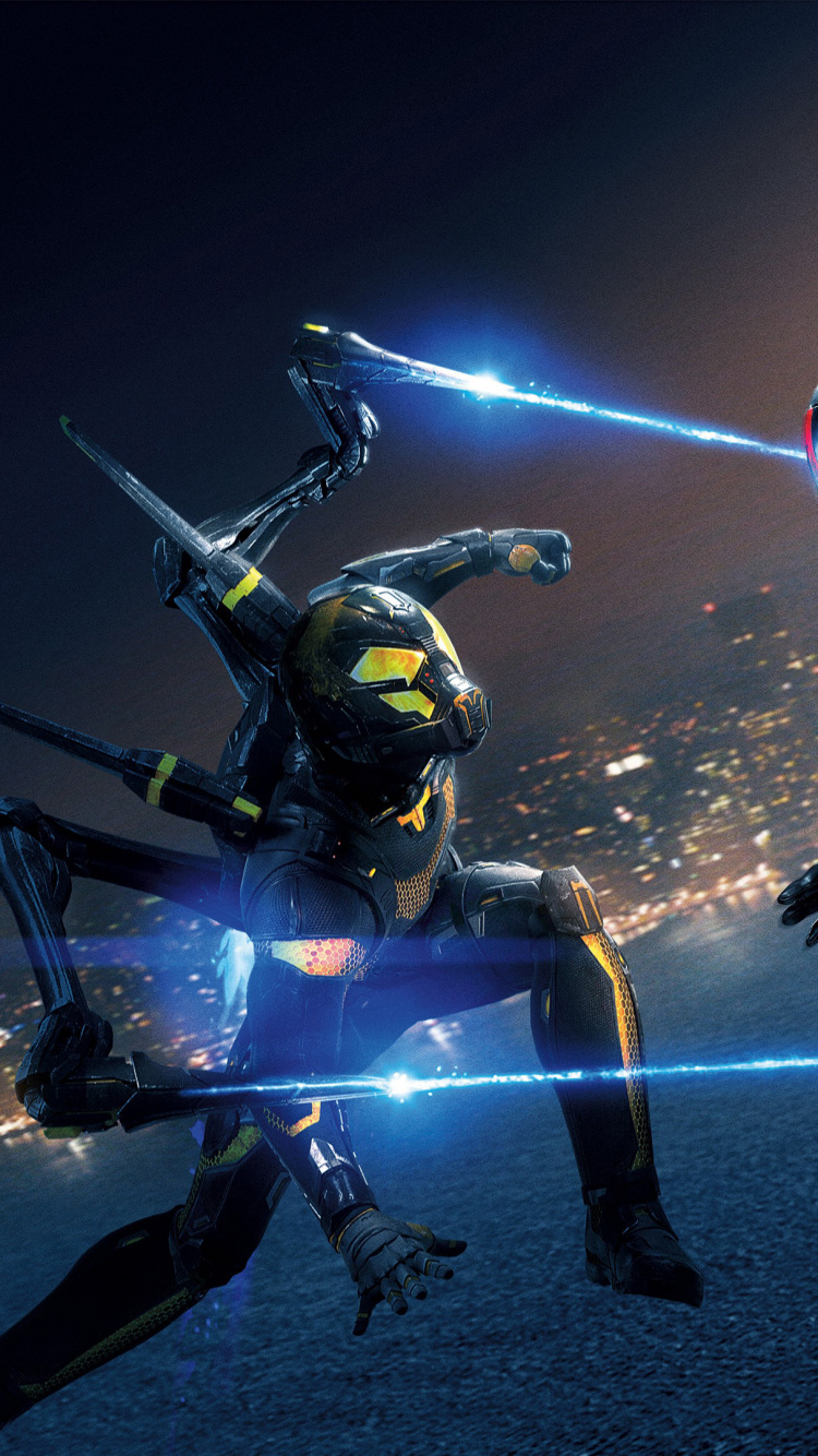 Man in Black and Red Suit Holding Black and Yellow Weapon. Wallpaper in 750x1334 Resolution