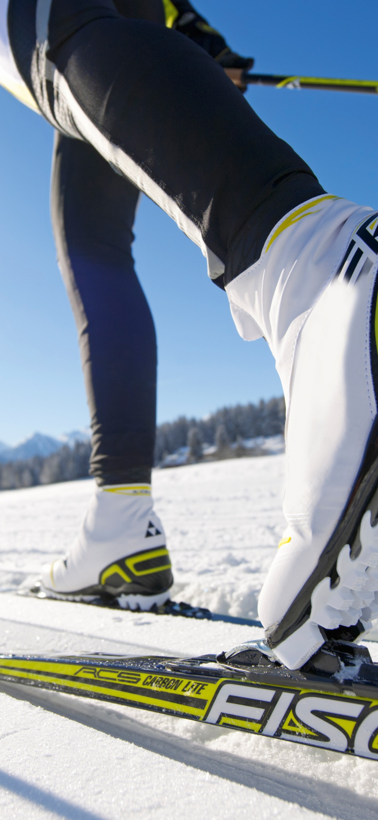 Person in White and Blue Pants and White Snow Ski. Wallpaper in 1242x2688 Resolution