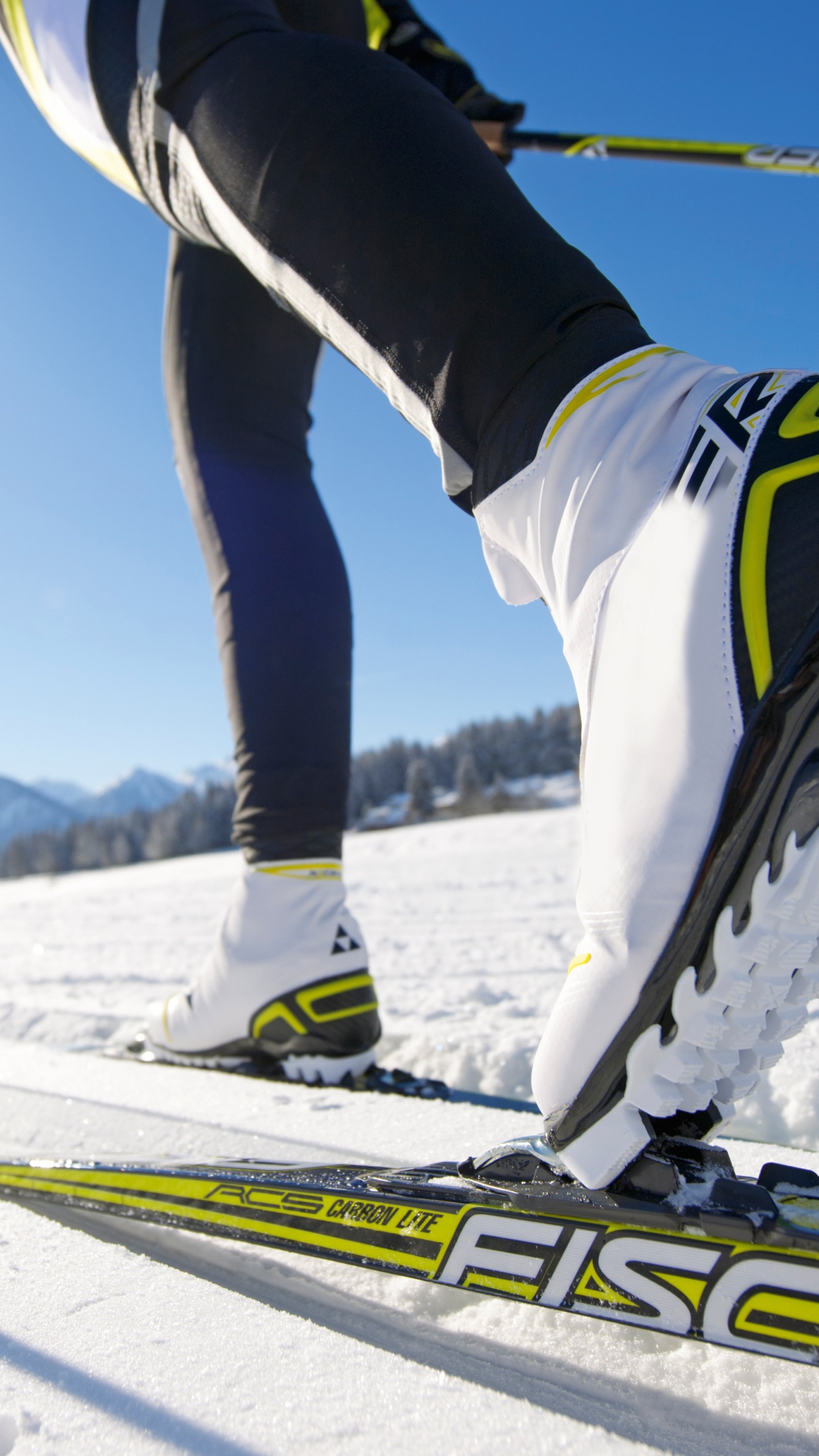 Person in White and Blue Pants and White Snow Ski. Wallpaper in 1440x2560 Resolution