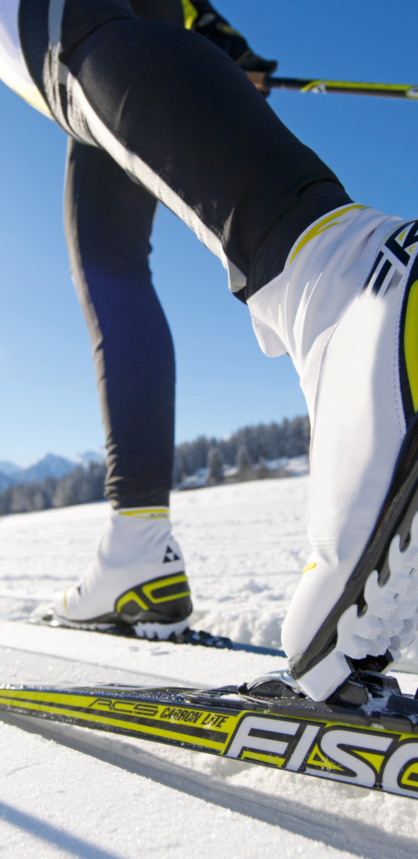 Person in White and Blue Pants and White Snow Ski. Wallpaper in 1440x2960 Resolution