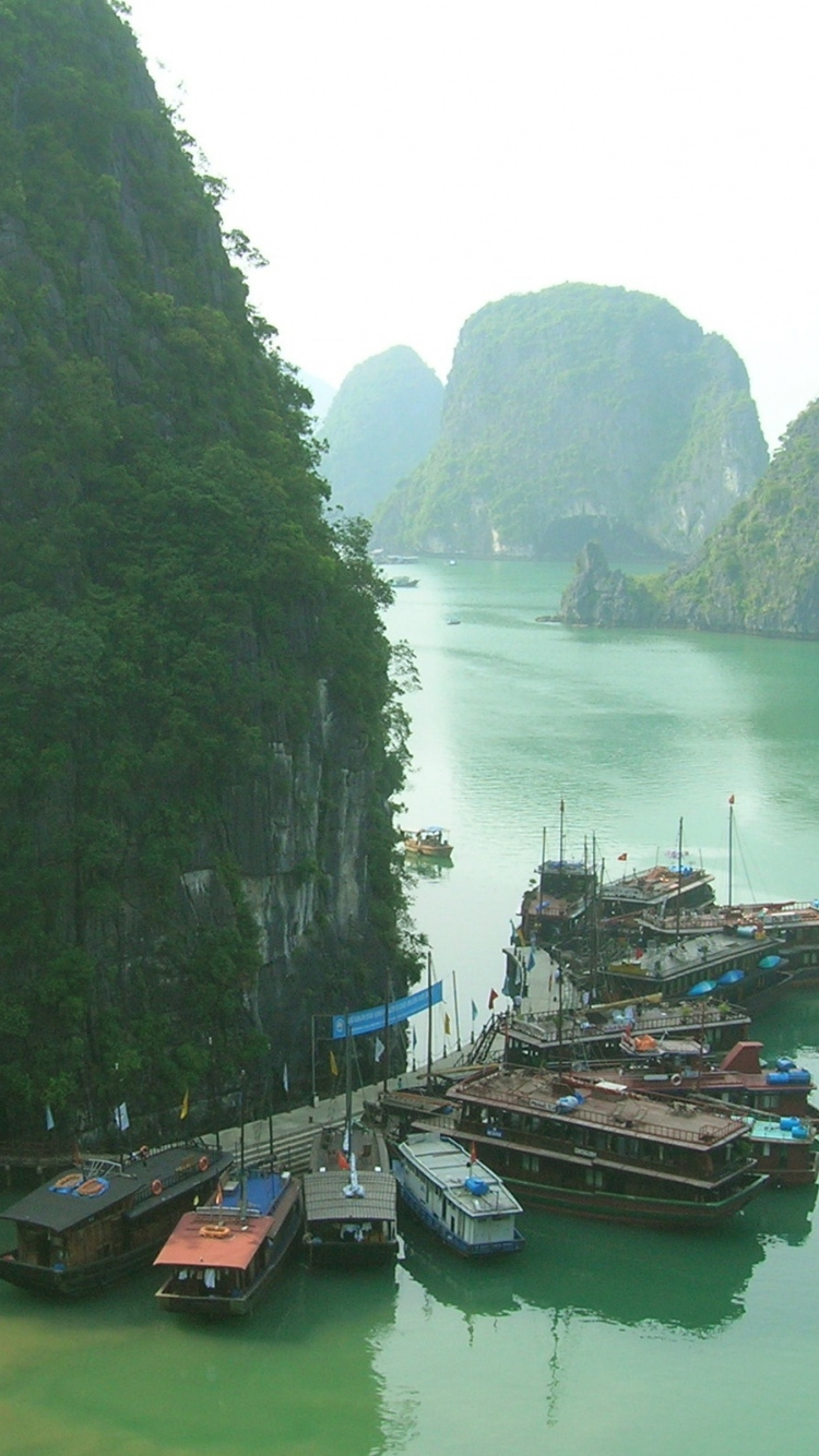 Boats on Water Near Mountain During Daytime. Wallpaper in 750x1334 Resolution