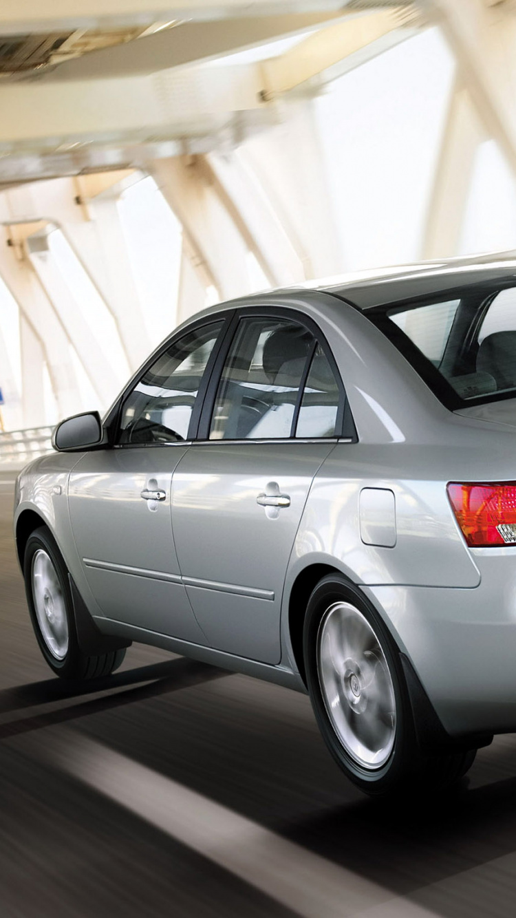 Silver Mercedes Benz Sedan on Road During Daytime. Wallpaper in 750x1334 Resolution