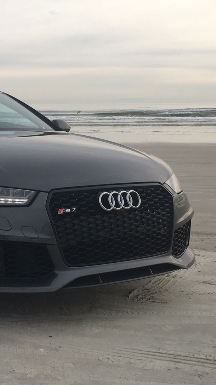 Coupé Audi Noir Sur Sable Gris Pendant la Journée. Wallpaper in 750x1334 Resolution