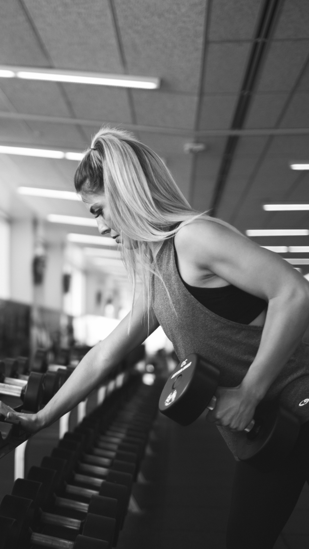 Woman in Black Tank Top Doing Exercise. Wallpaper in 1080x1920 Resolution