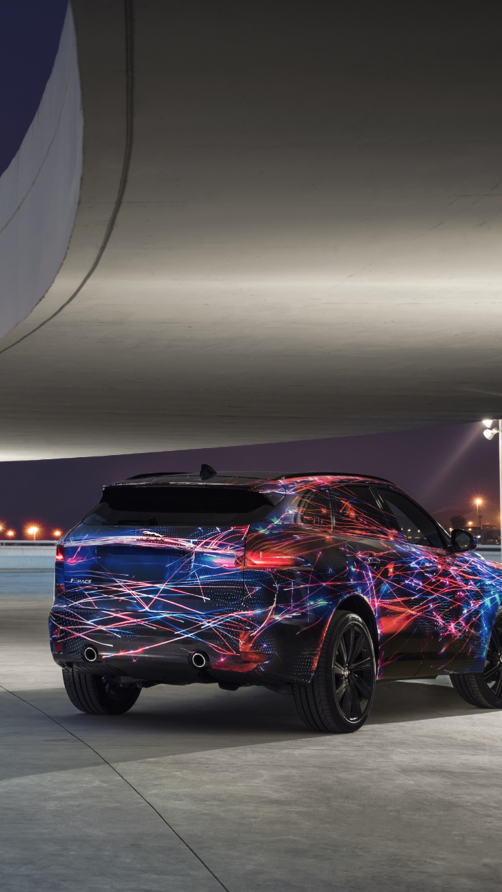 Porsche 911 Morado Estacionado en Una Habitación Blanca. Wallpaper in 720x1280 Resolution