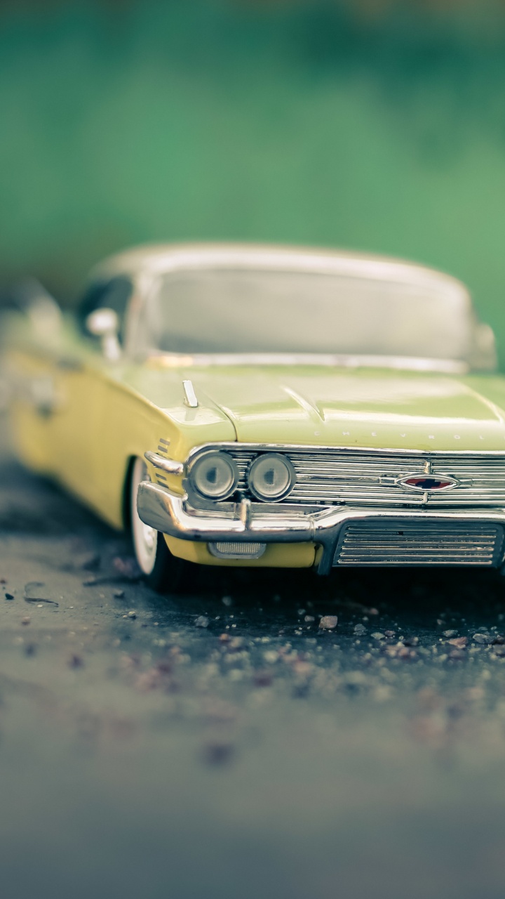 Modelo de Coche Blanco Fundido a Presión. Wallpaper in 720x1280 Resolution