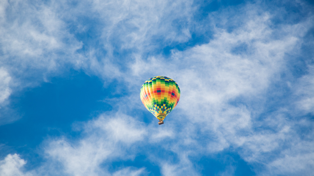 Yellow Hot Air Balloon in Mid Air Under Blue Sky During Daytime. Wallpaper in 1280x720 Resolution