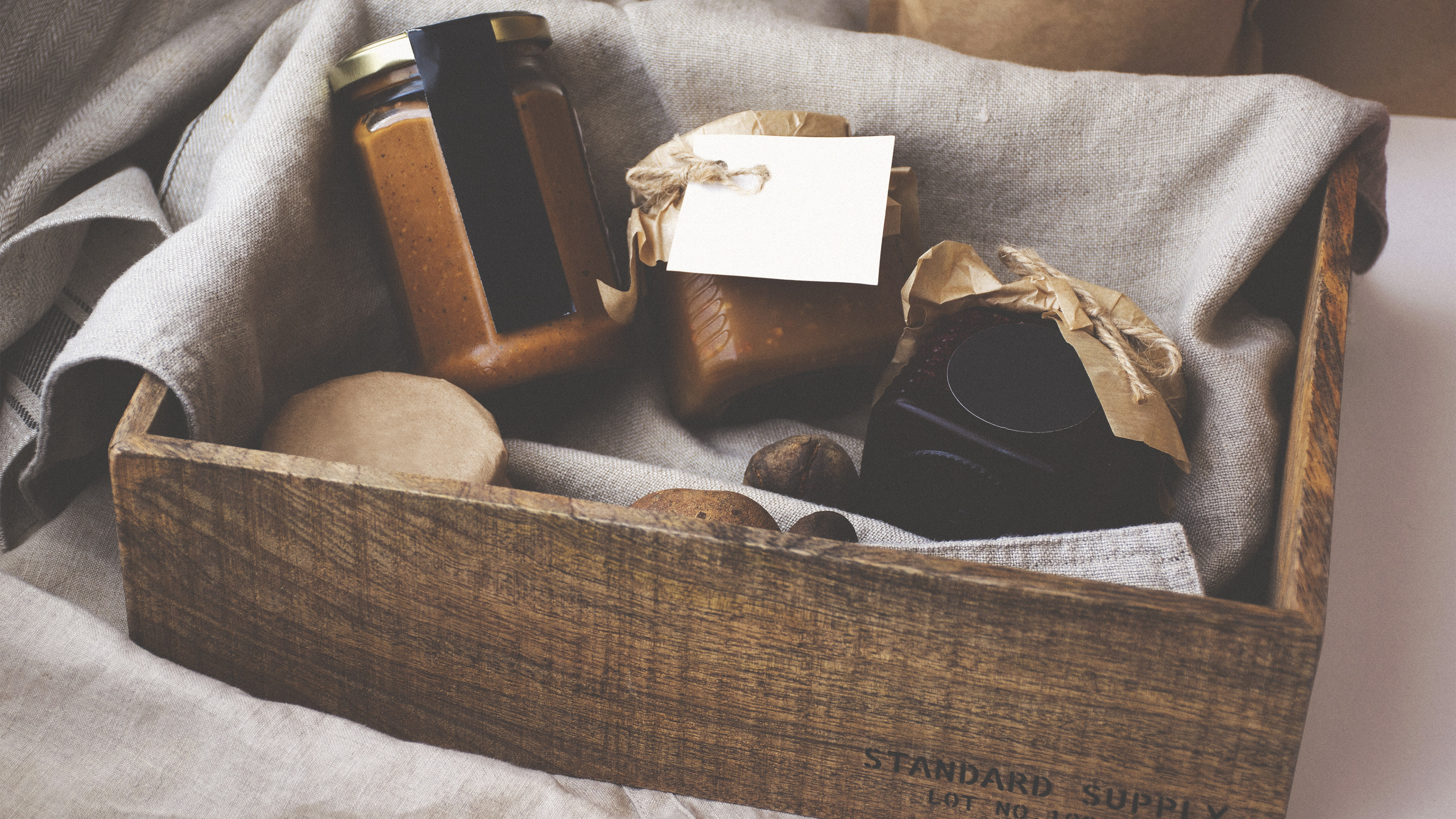 Brown and White Box on White Textile. Wallpaper in 3840x2160 Resolution