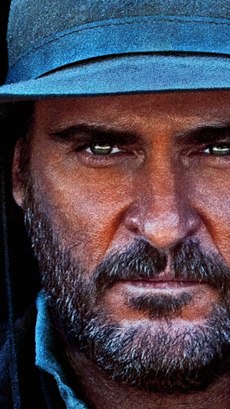 Hombre Con Sombrero de Vaquero Negro. Wallpaper in 750x1334 Resolution