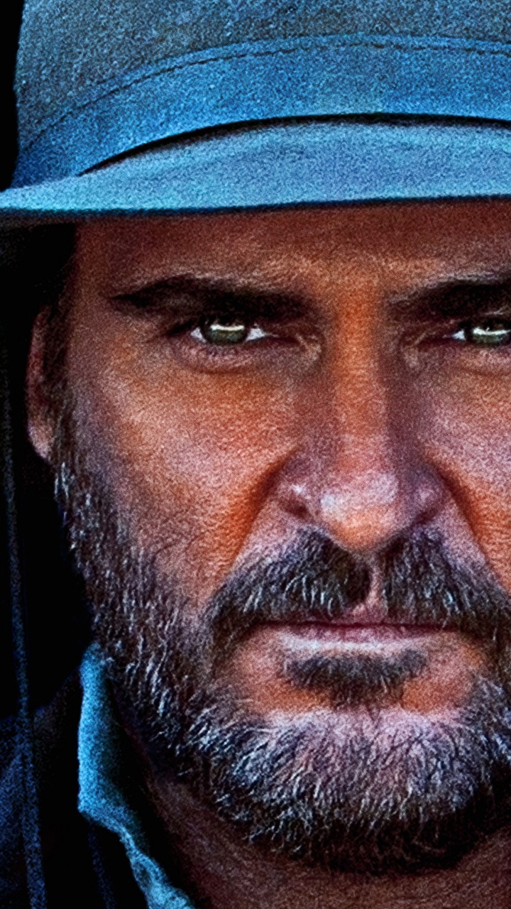 Homme au Chapeau de Cowboy Noir. Wallpaper in 720x1280 Resolution