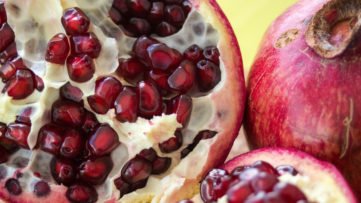 Red and Black Fruit on Yellow and White Floral Textile. Wallpaper in 1366x768 Resolution