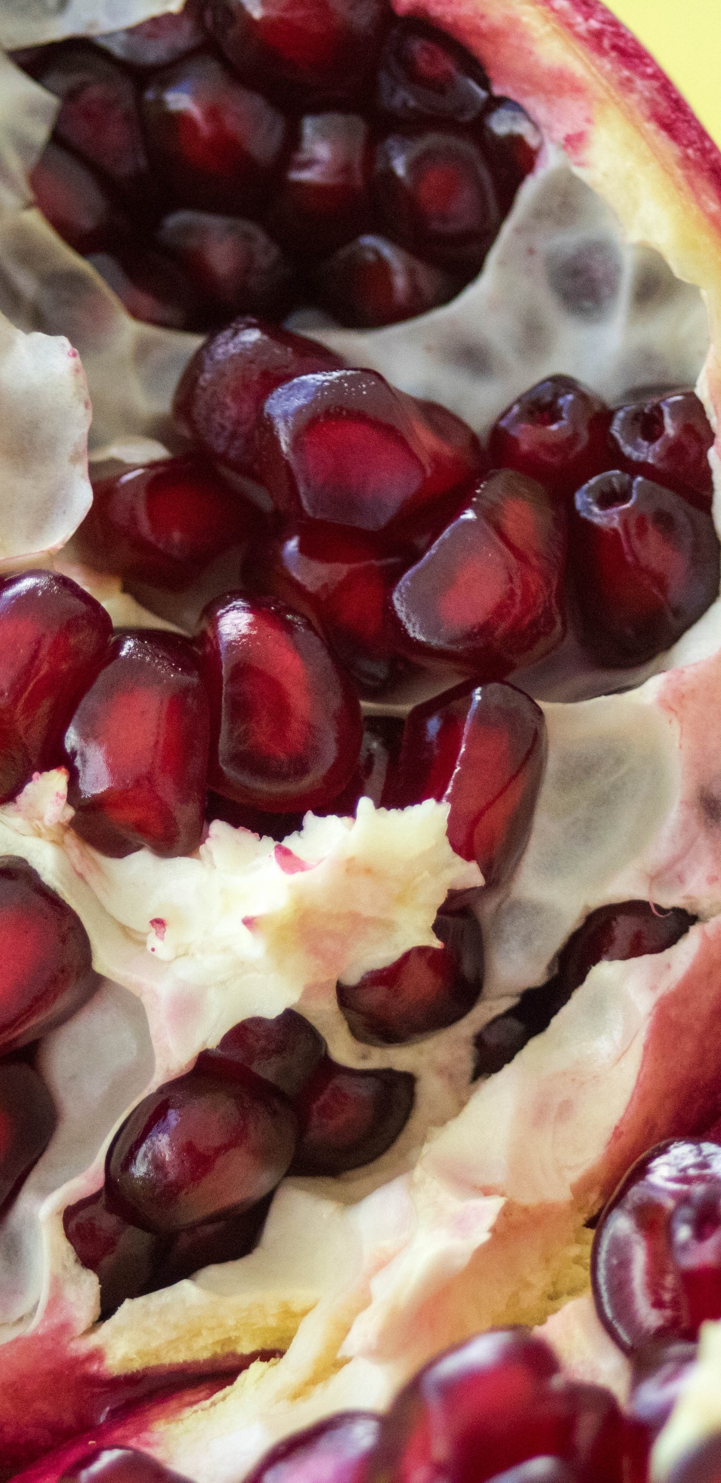 Red and Black Fruit on Yellow and White Floral Textile. Wallpaper in 1440x2960 Resolution