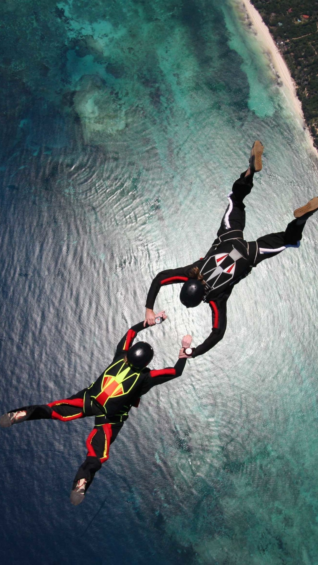 Man in Black Shorts and Black Shirt on Body of Water During Daytime. Wallpaper in 1080x1920 Resolution
