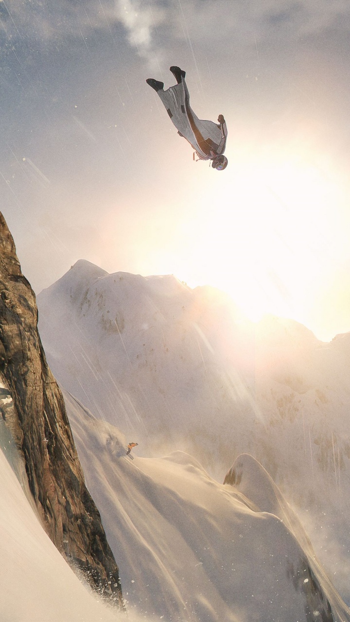 Homme en Veste Noire et Pantalon Accroché au Téléphérique Pendant la Journée. Wallpaper in 720x1280 Resolution