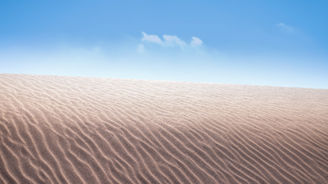 Brown Sand Under Blue Sky During Daytime. Wallpaper in 1366x768 Resolution