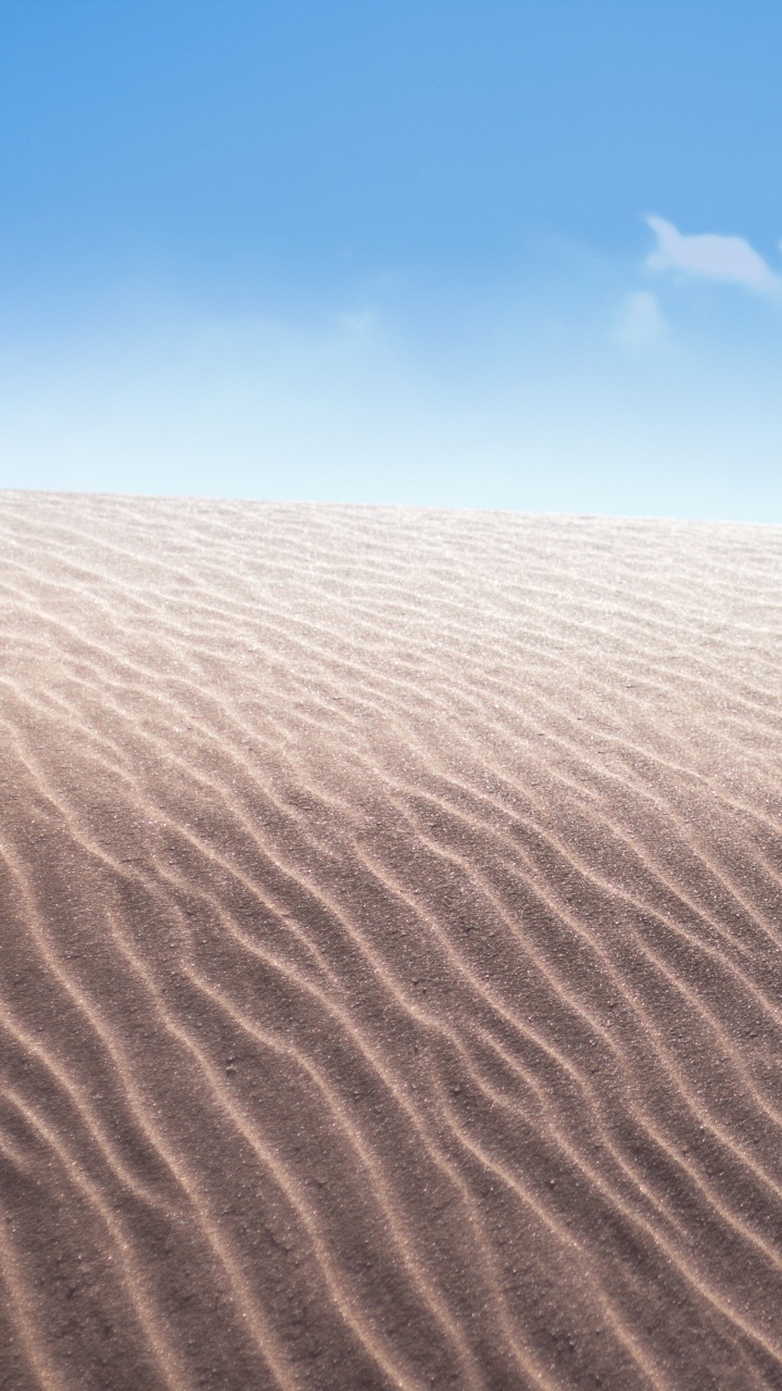 Brown Sand Under Blue Sky During Daytime. Wallpaper in 720x1280 Resolution