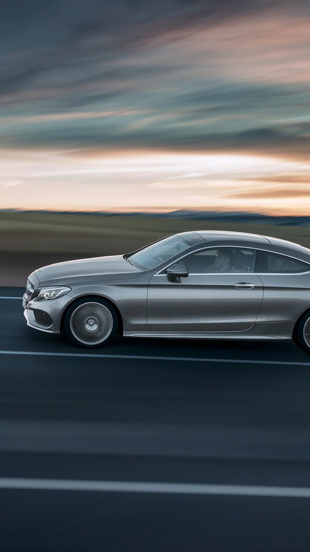 Gray Coupe on Gray Asphalt Road. Wallpaper in 1080x1920 Resolution