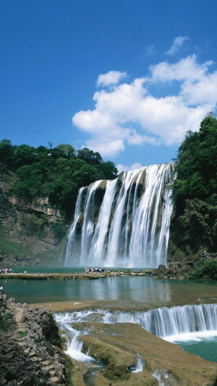 Waterfalls Under Blue Sky and White Clouds During Daytime. Wallpaper in 720x1280 Resolution