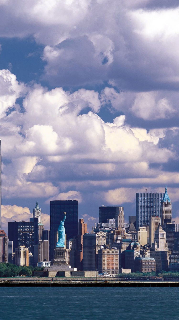 City Skyline Under White Clouds and Blue Sky During Daytime. Wallpaper in 750x1334 Resolution