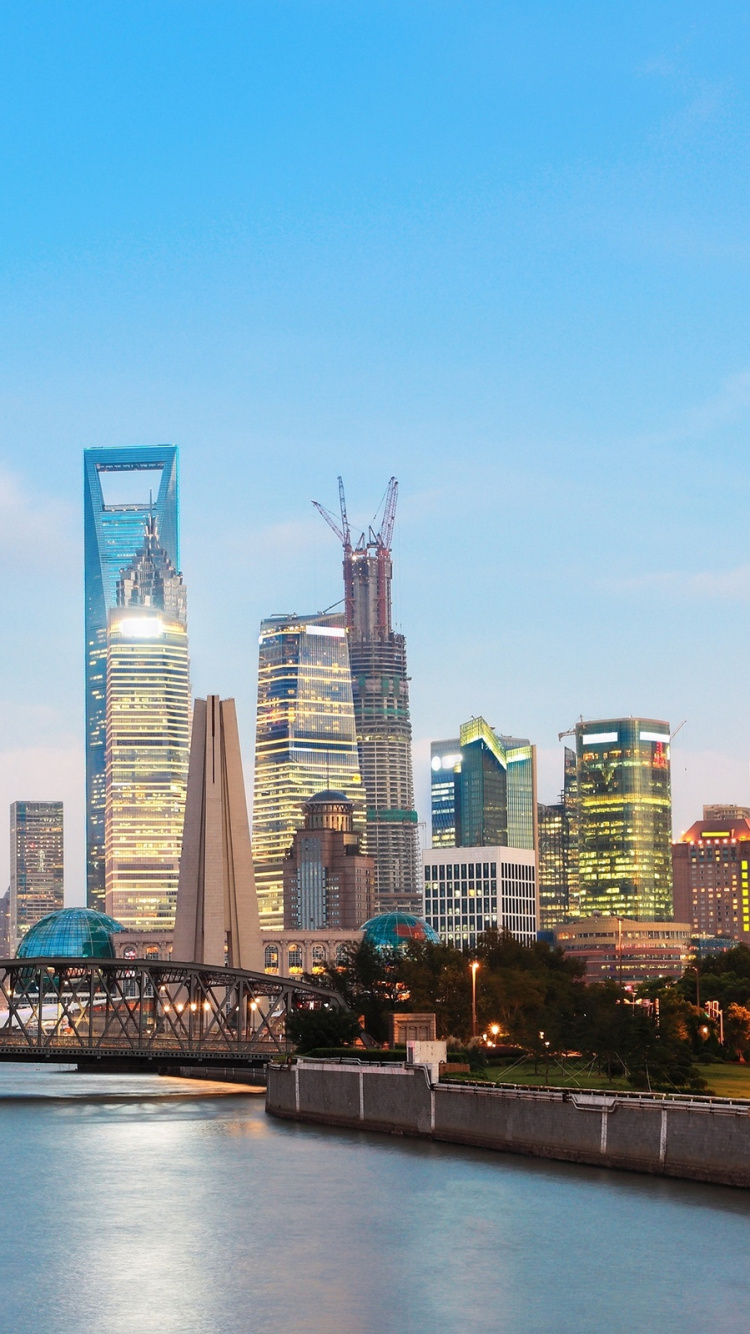 City Skyline During Night Time. Wallpaper in 750x1334 Resolution