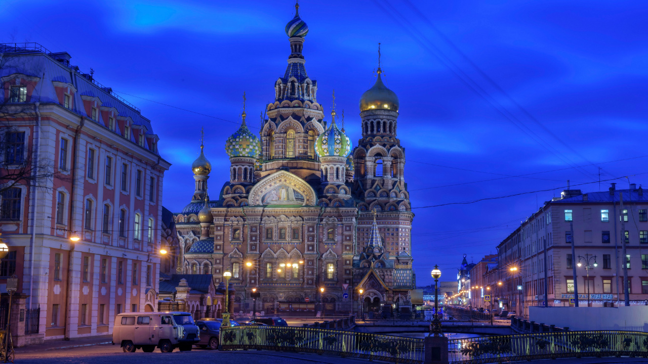 White and Brown Concrete Building During Night Time. Wallpaper in 1280x720 Resolution