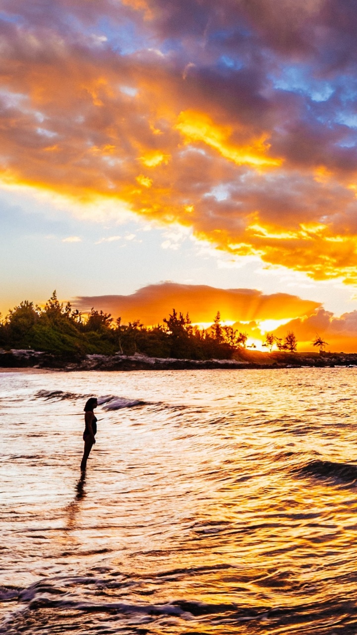 Silhouette of Person Standing on Sea Shore During Sunset. Wallpaper in 720x1280 Resolution