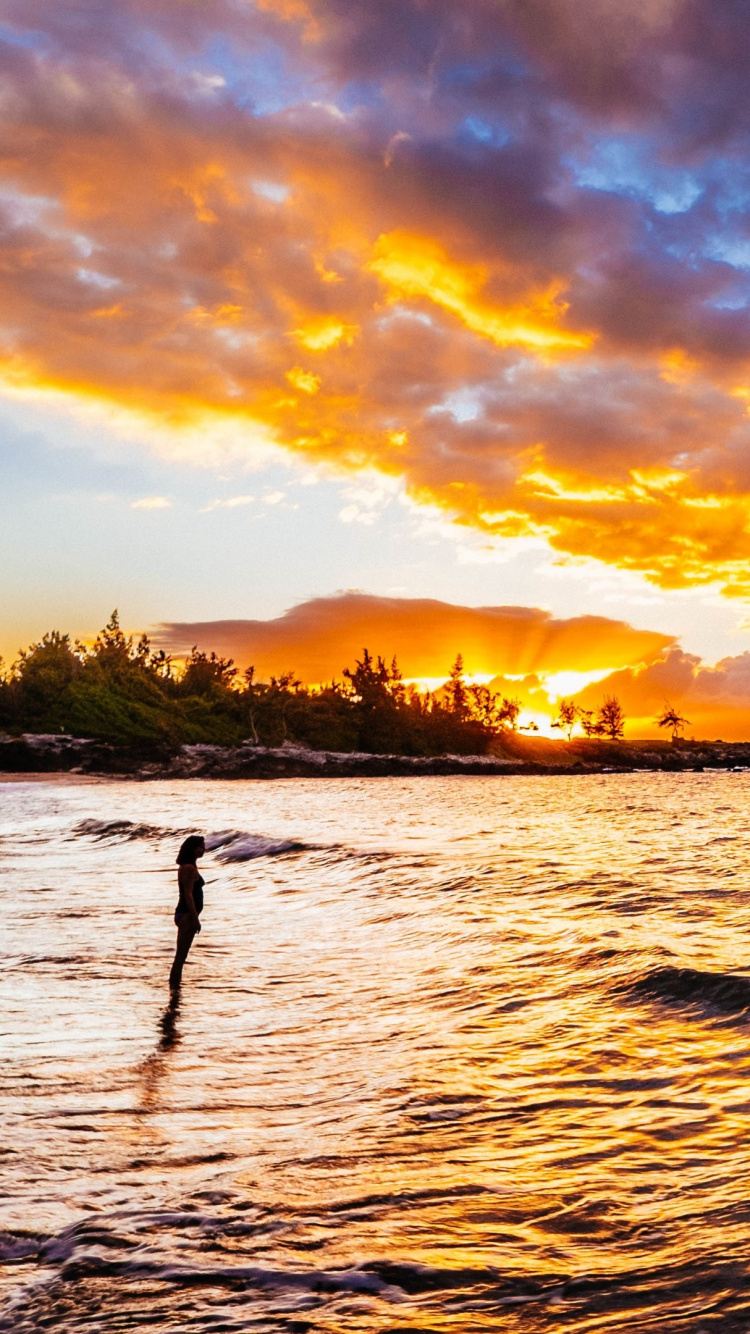 Silhouette of Person Standing on Sea Shore During Sunset. Wallpaper in 750x1334 Resolution