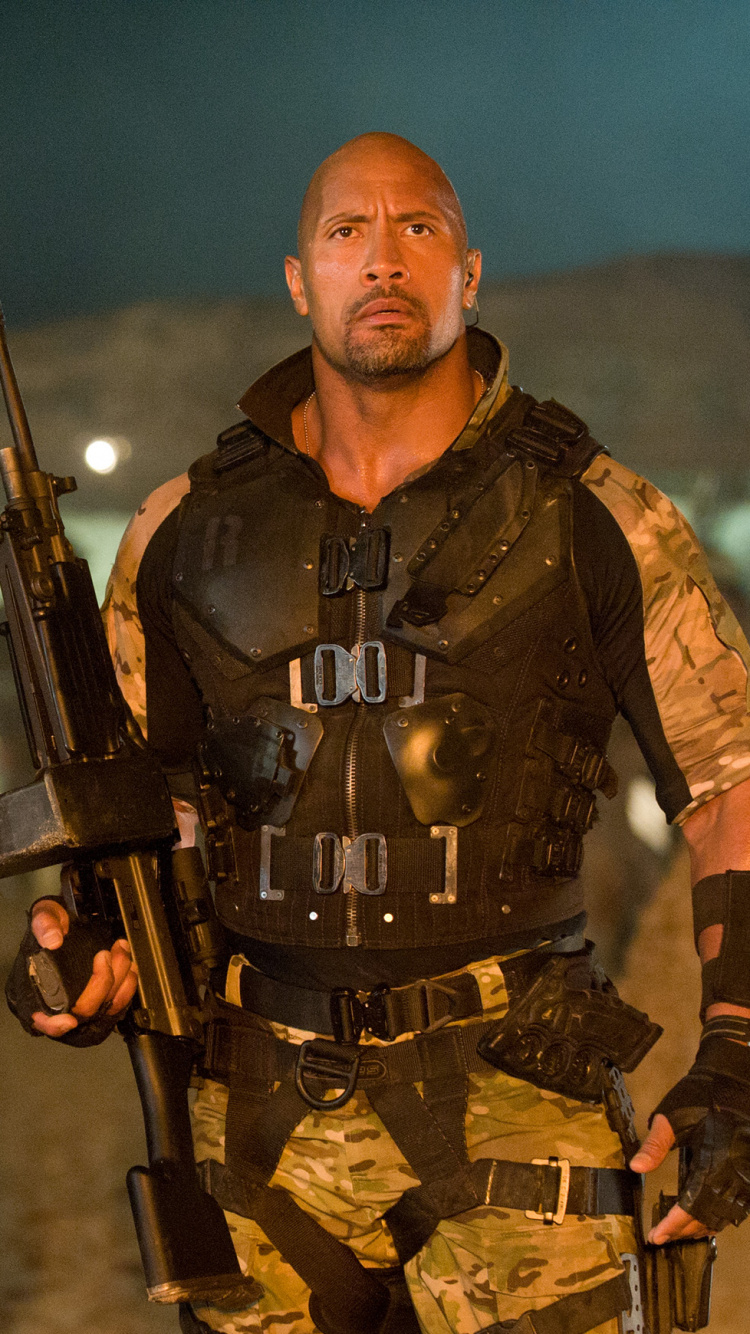 Man in Brown and Black Camouflage Army Uniform Holding Rifle. Wallpaper in 750x1334 Resolution