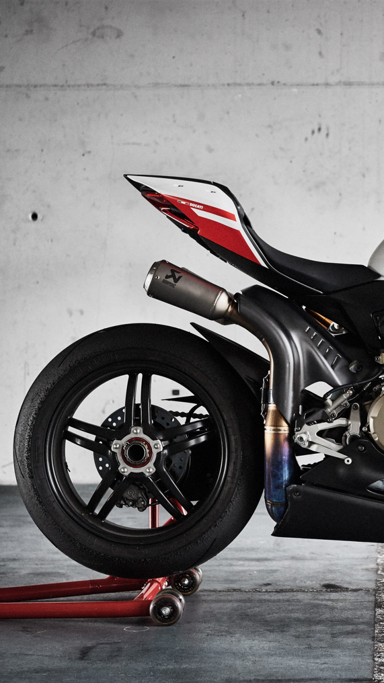 Red and Black Sports Bike. Wallpaper in 750x1334 Resolution