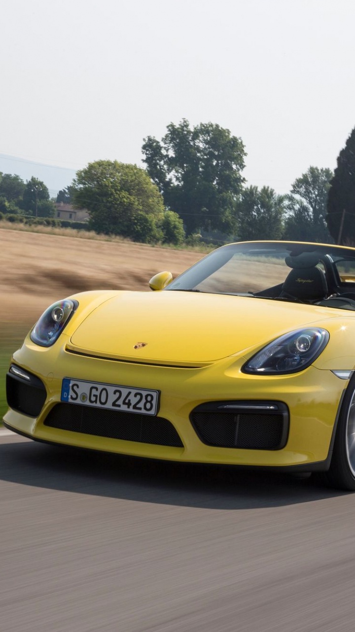 Yellow Porsche 911 on Road During Daytime. Wallpaper in 720x1280 Resolution