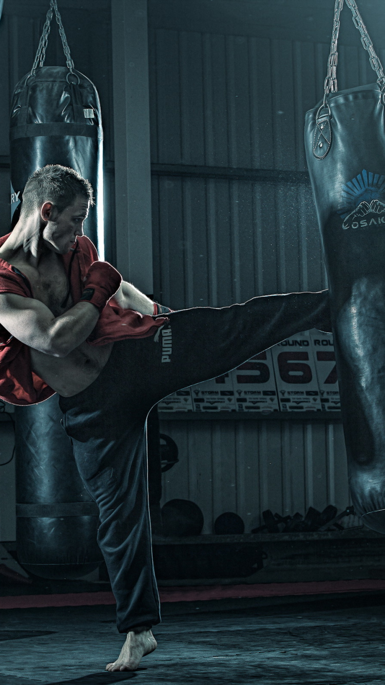 Mann in Rot-weißer Jacke Und Blauer Jeans. Wallpaper in 750x1334 Resolution