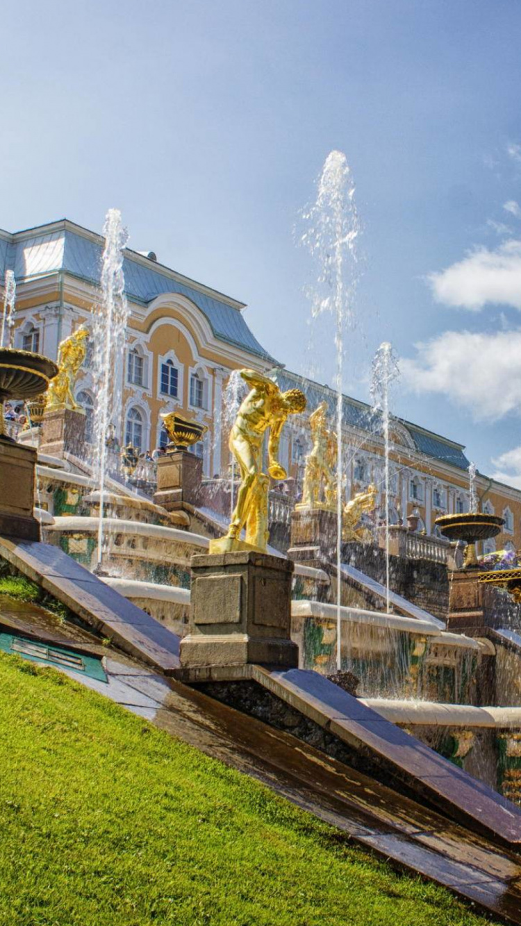 Water Fountain in Front of Building. Wallpaper in 750x1334 Resolution