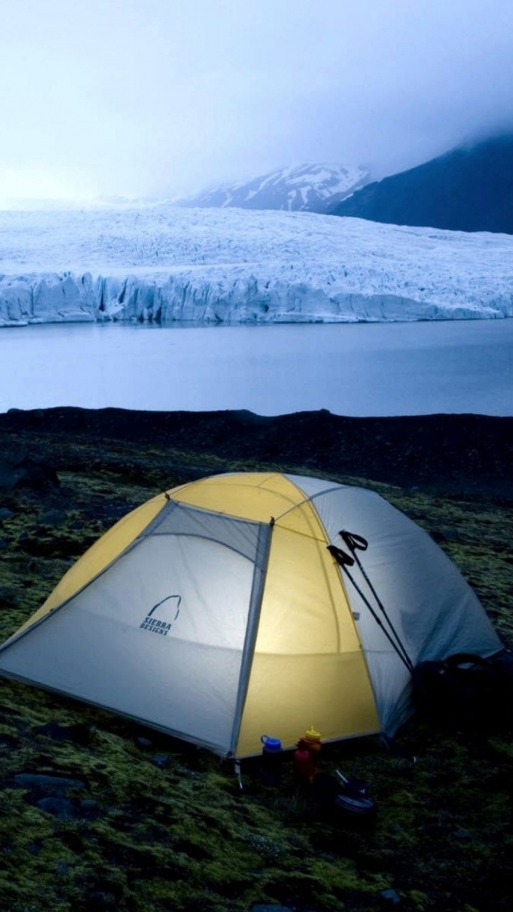 Yellow Tent on Green Grass Field Near Snow Covered Mountain During Daytime. Wallpaper in 720x1280 Resolution