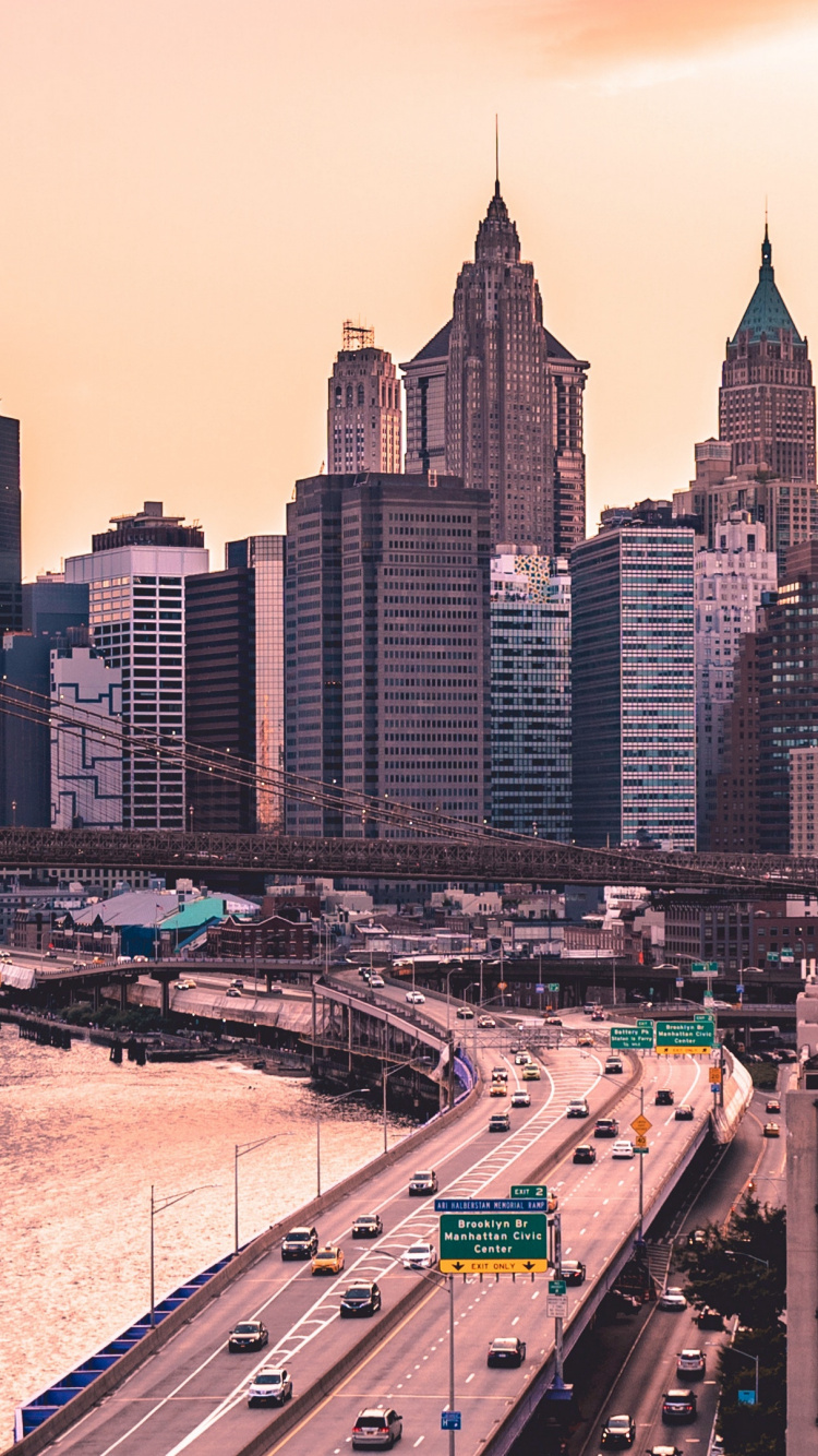 City Buildings Under White Sky During Daytime. Wallpaper in 750x1334 Resolution
