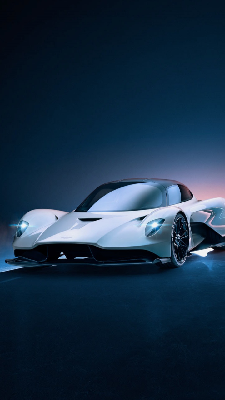Weißer Und Schwarzer Sportwagen. Wallpaper in 720x1280 Resolution