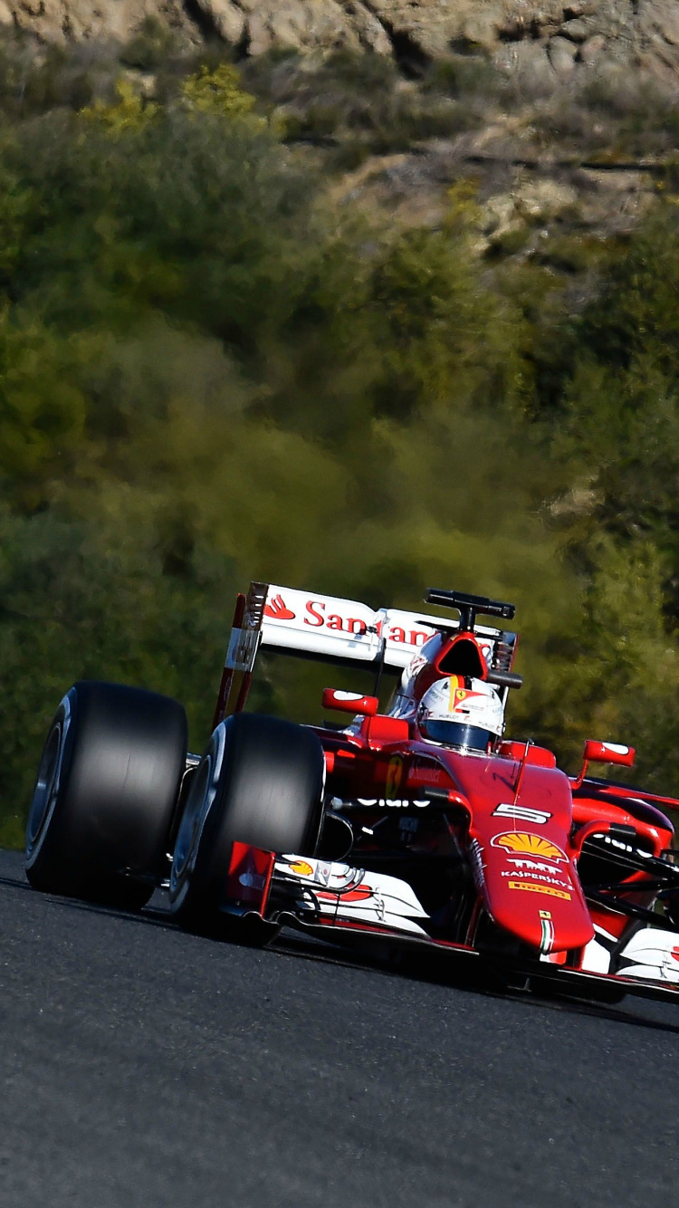 Red and Black Formula 1 on Road During Daytime. Wallpaper in 750x1334 Resolution