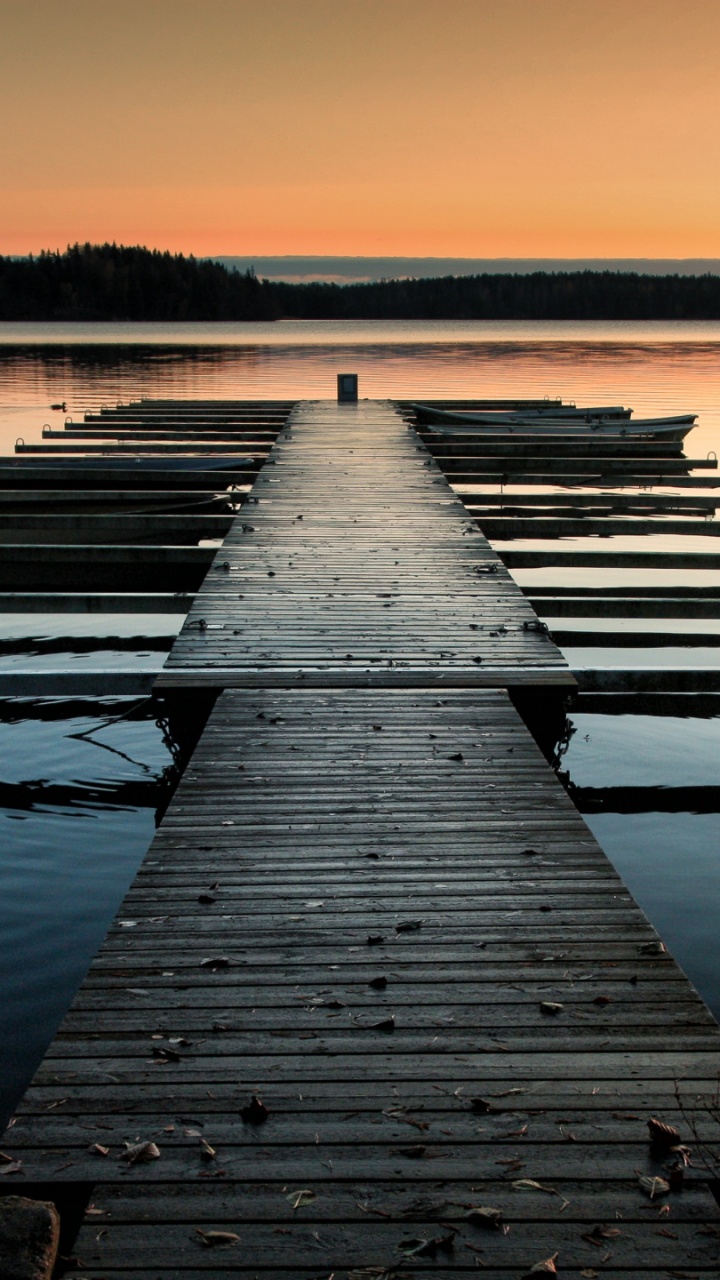 Brown Wooden Dock on Body of Water During Sunset. Wallpaper in 720x1280 Resolution