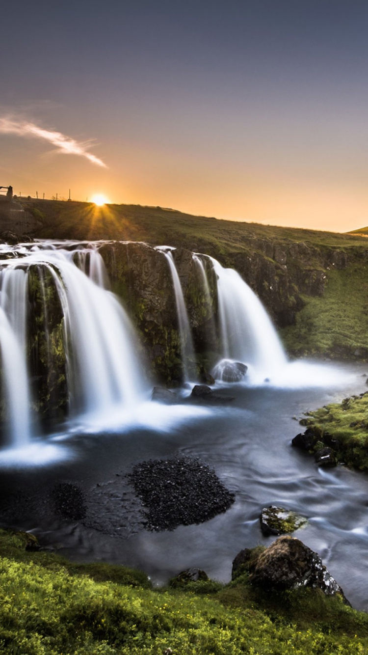Waterfalls on Green Grass Field During Daytime. Wallpaper in 750x1334 Resolution