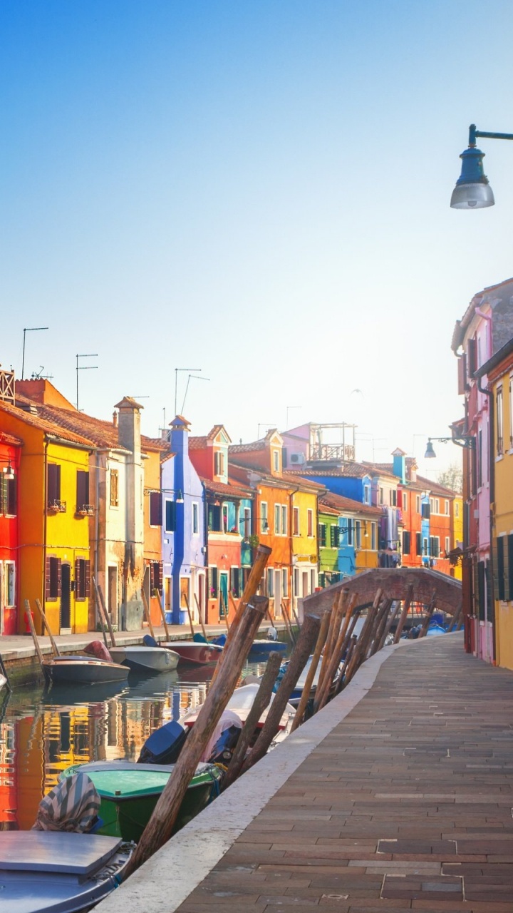 Boat on Dock Near Buildings During Daytime. Wallpaper in 720x1280 Resolution