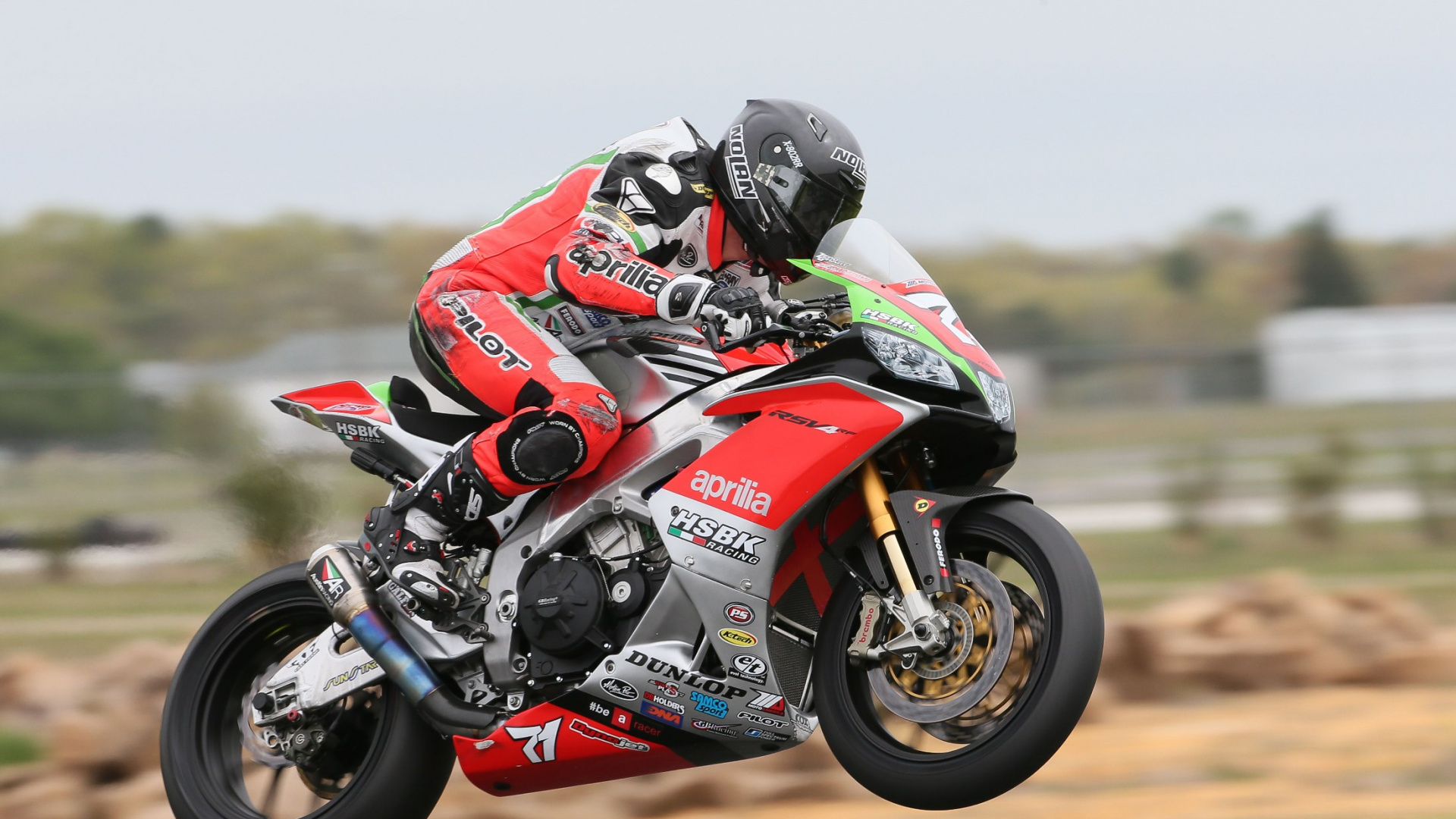 Man in Red and Black Motorcycle Helmet Riding on Red and Black Sports Bike. Wallpaper in 1920x1080 Resolution