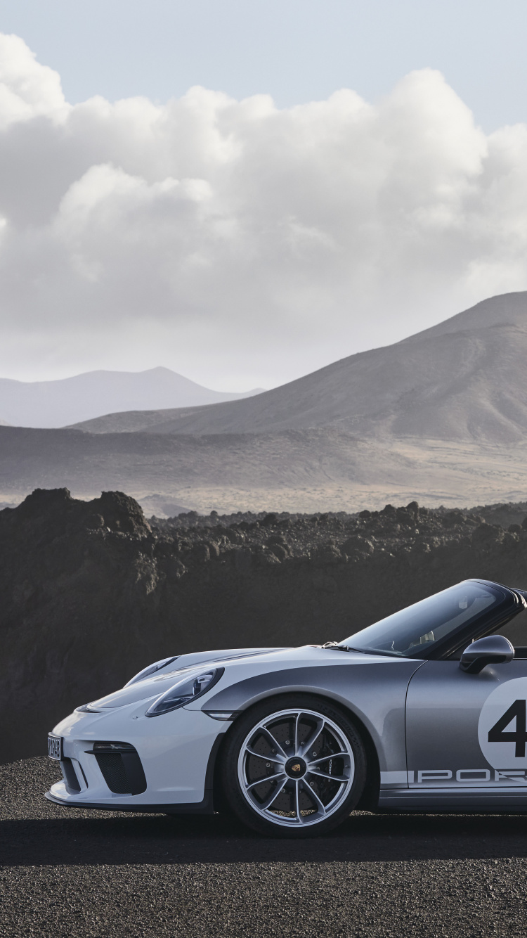 Black Porsche 911 on Road Near Mountain During Daytime. Wallpaper in 750x1334 Resolution