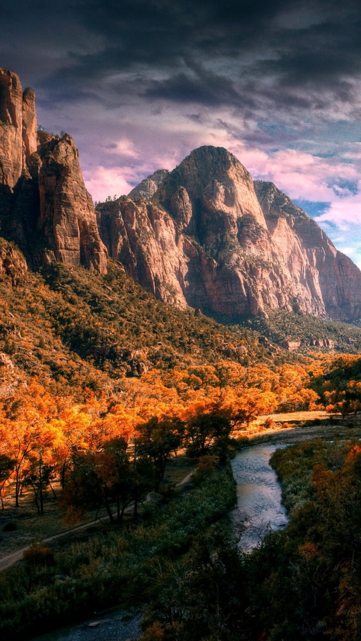 River Between Green Grass and Trees Near Mountains Under White Clouds and Blue Sky During Daytime. Wallpaper in 720x1280 Resolution