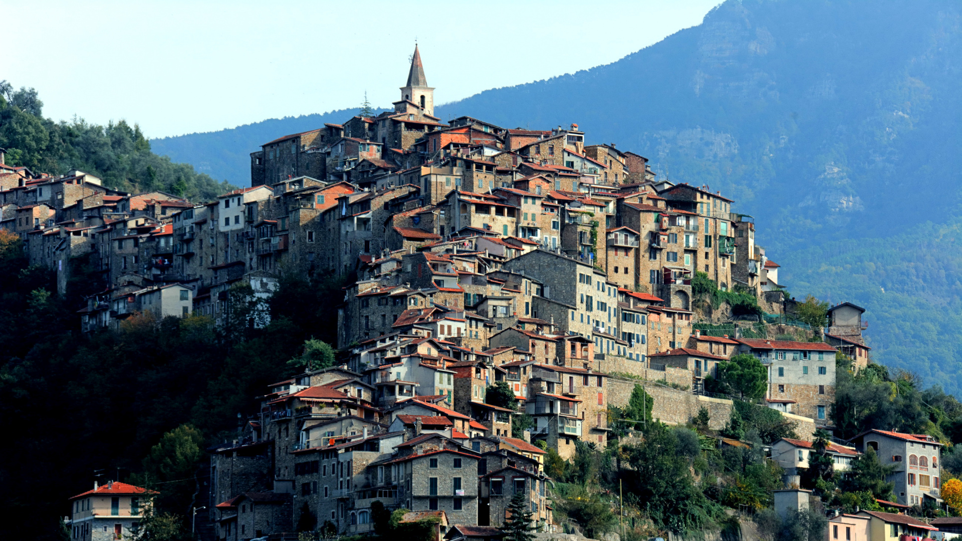 Brown and White Concrete Houses on Mountain. Wallpaper in 1920x1080 Resolution