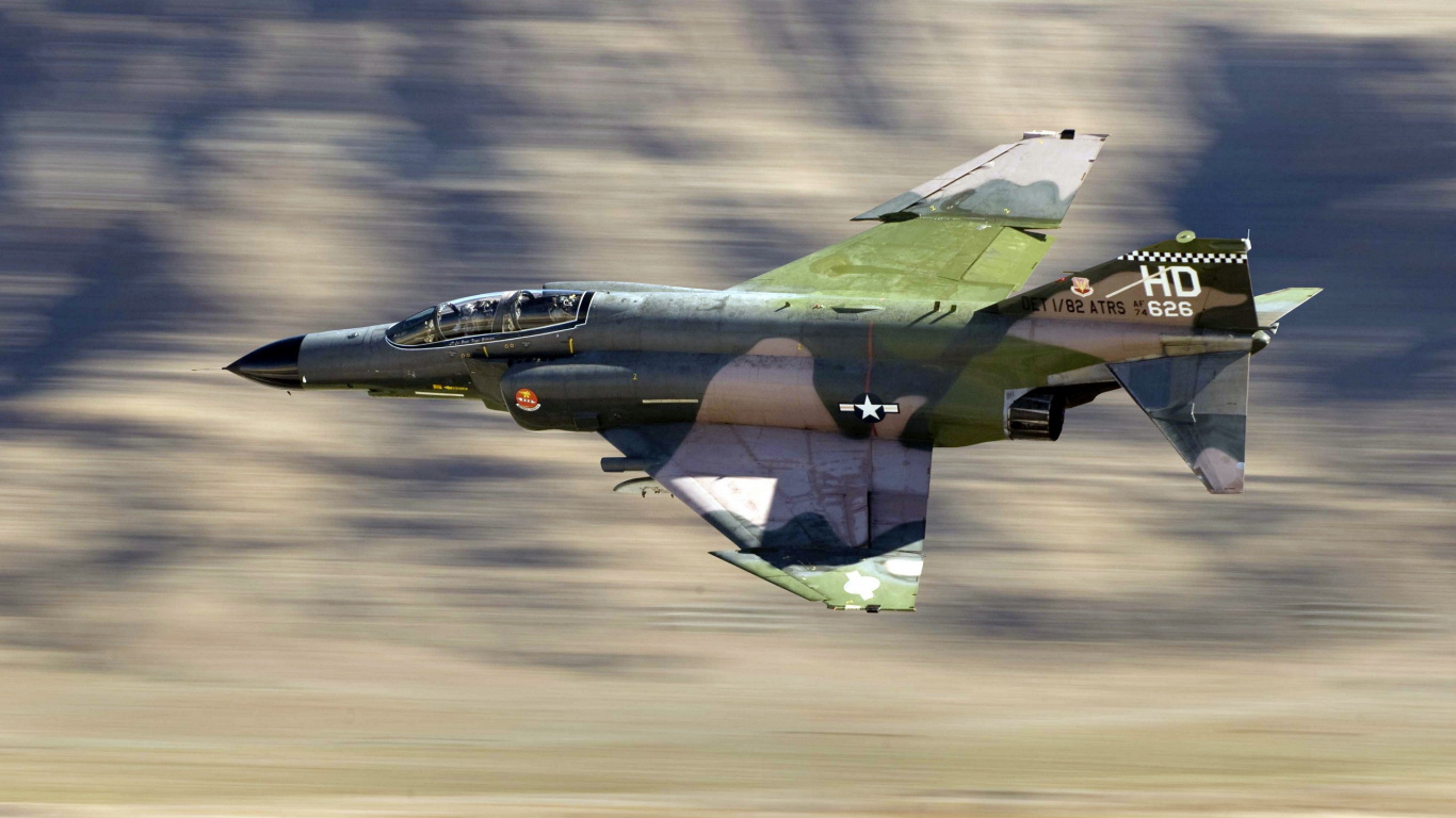 Green and Black Fighter Jet. Wallpaper in 1366x768 Resolution