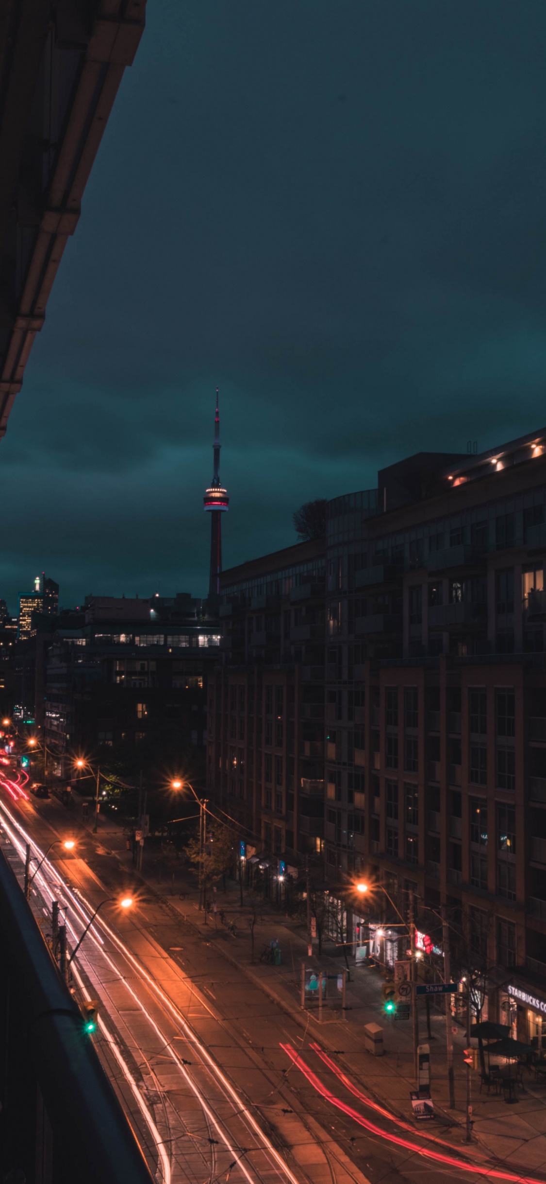 Bâtiments de la Ville Pendant la Nuit. Wallpaper in 1125x2436 Resolution