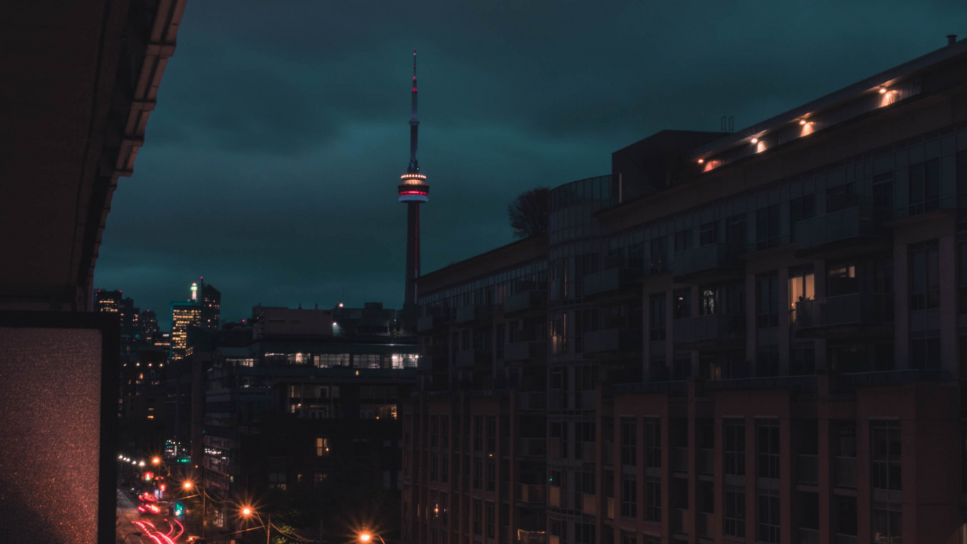 City Buildings During Night Time. Wallpaper in 1366x768 Resolution