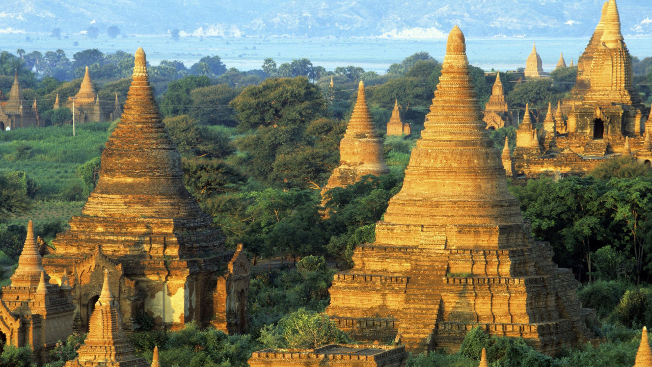 Brown Concrete Temple Surrounded by Green Trees During Daytime. Wallpaper in 1280x720 Resolution