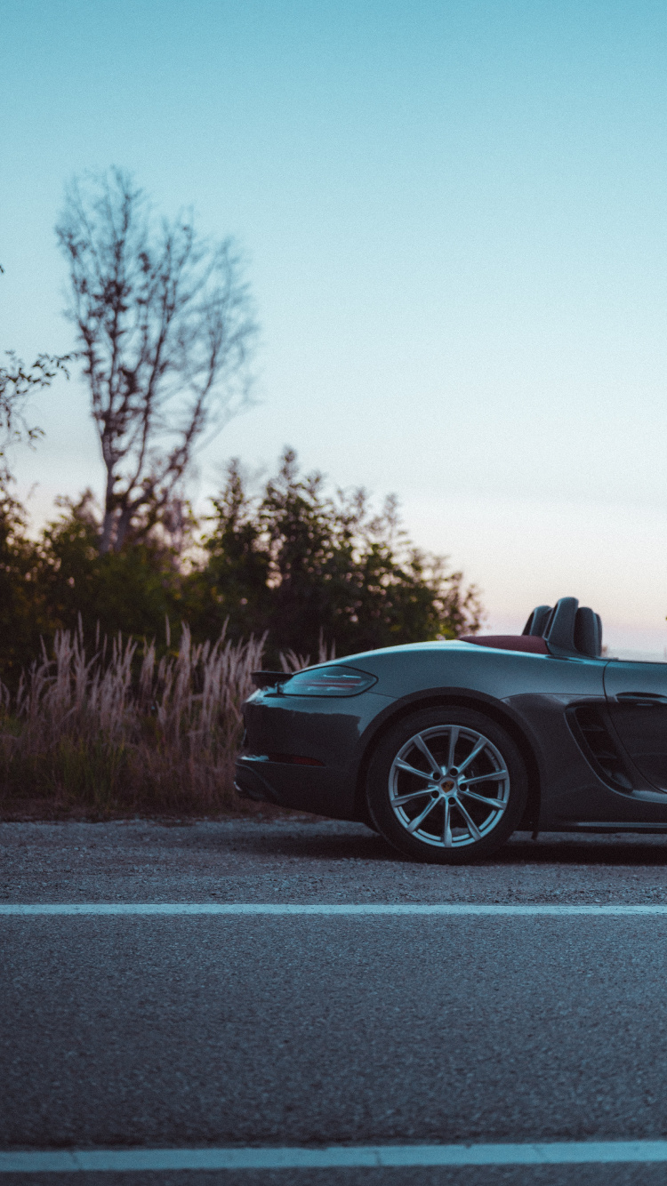 Black Porsche 911 on Road During Daytime. Wallpaper in 750x1334 Resolution