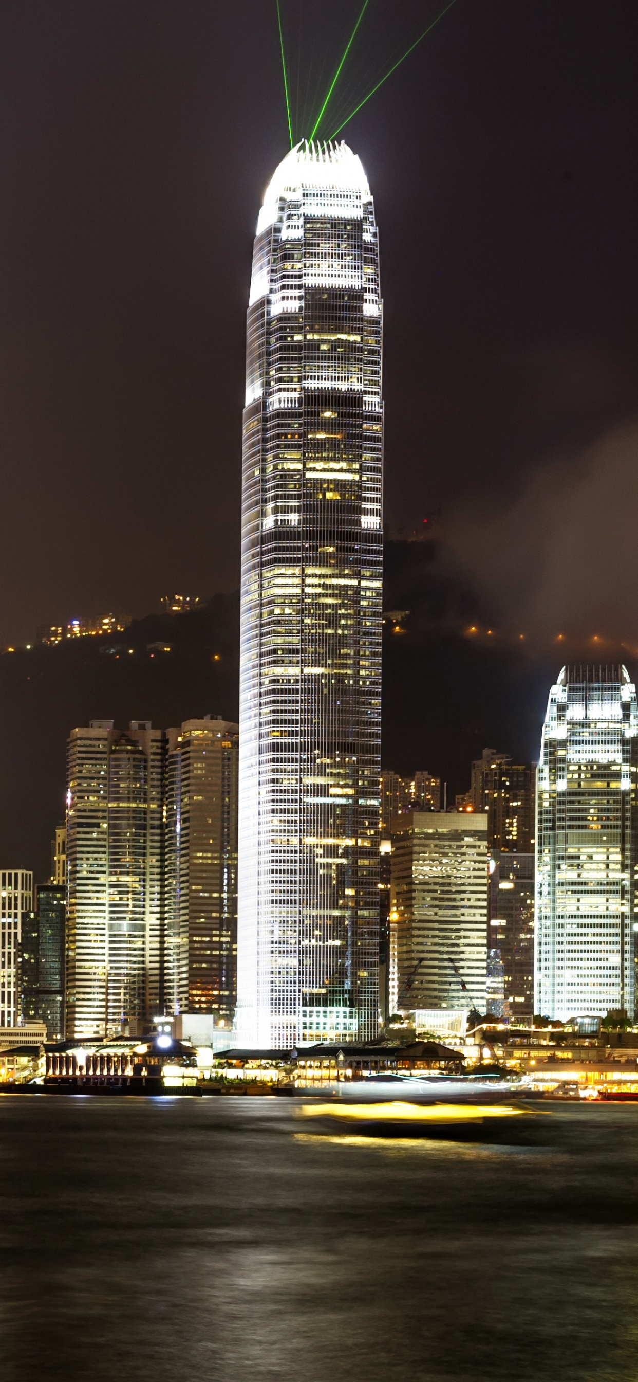 City Skyline During Night Time. Wallpaper in 1242x2688 Resolution